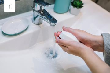 Washing hands thoroughly with soap to prevent eye infections
